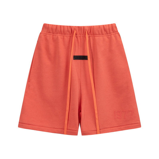 Fear of God Essentials 1977 Sweat Short Coral
