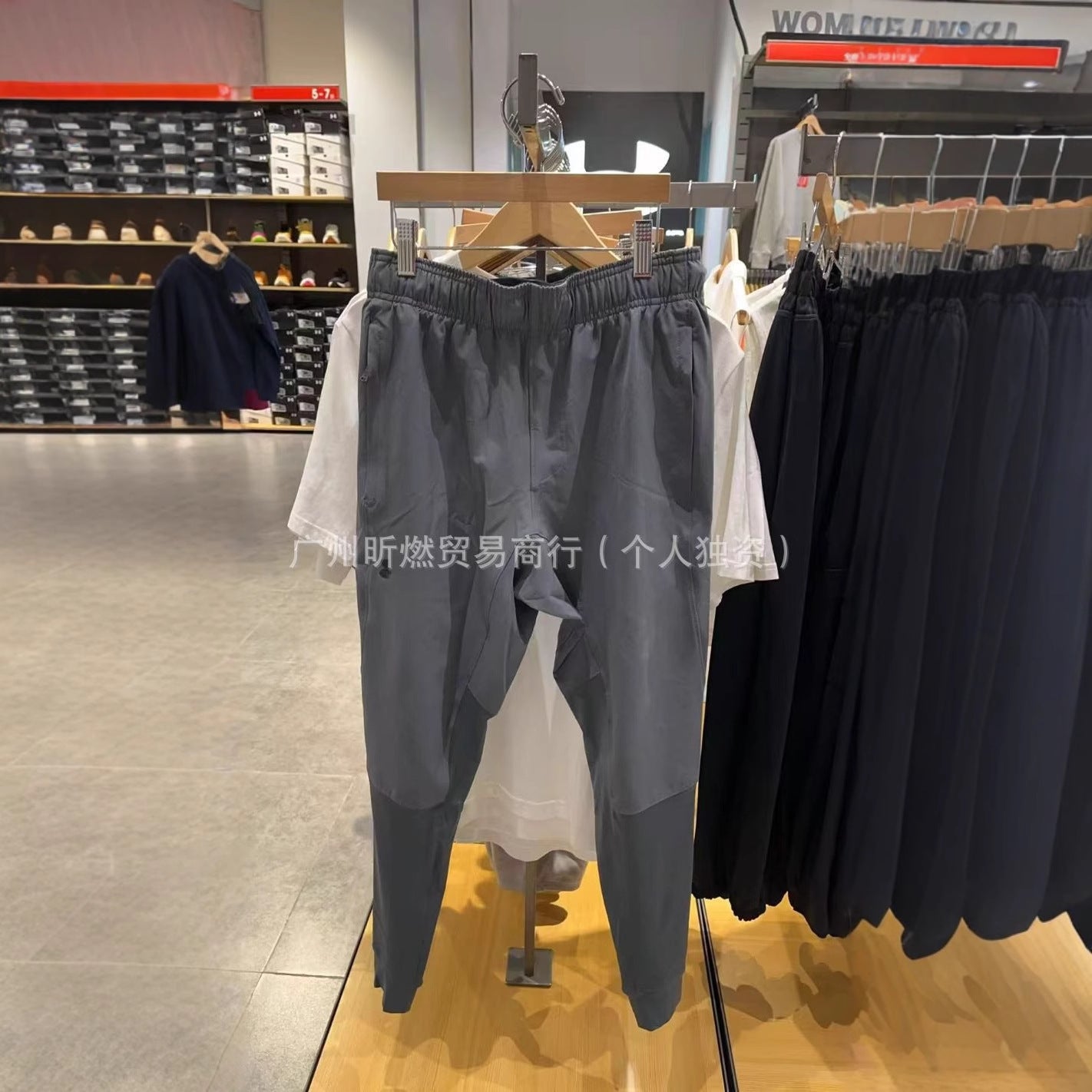 Cross-border men's outdoor sports sports students light and thin ice silk elastic breathable and quick-drying windproof trousers slacks in stock