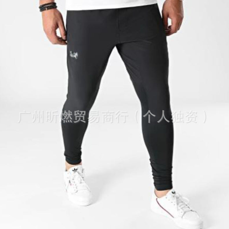 Cross-border men's outdoor sports sports students light and thin ice silk elastic breathable and quick-drying windproof trousers slacks in stock