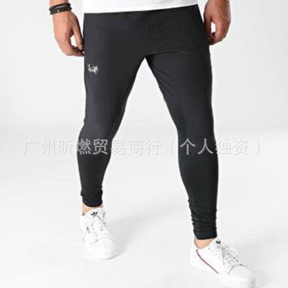 Cross-border men's outdoor sports sports students light and thin ice silk elastic breathable and quick-drying windproof trousers slacks in stock